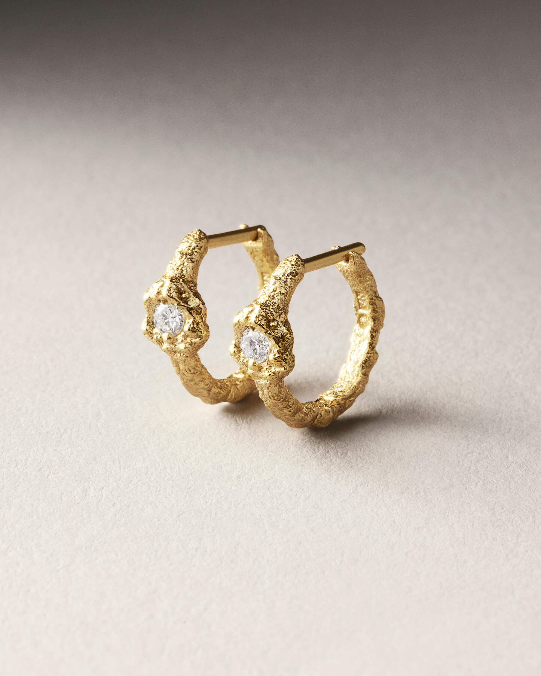 Gold hoop with diamond